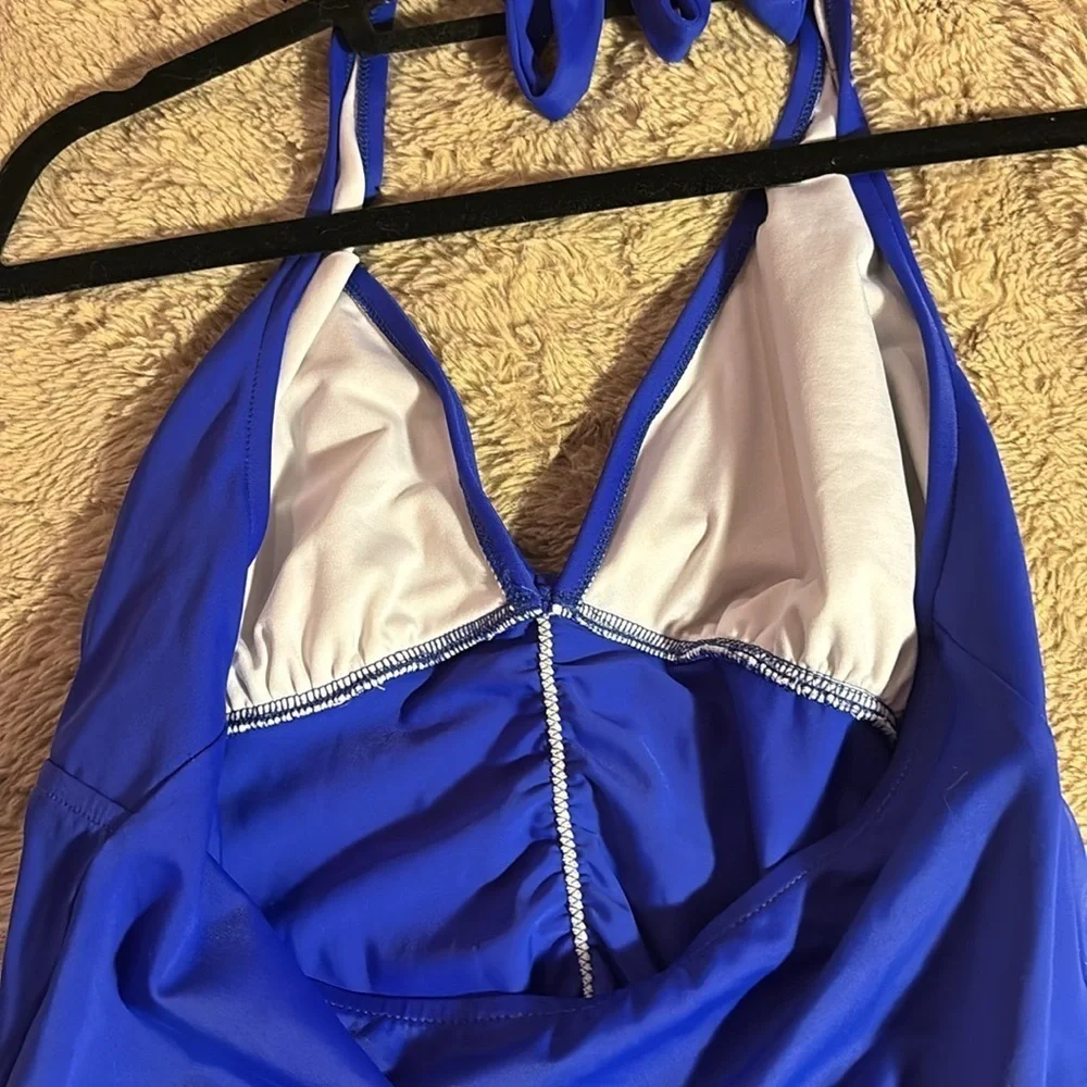 Show off your curves! Hit the beach in this Venus halter tankini top